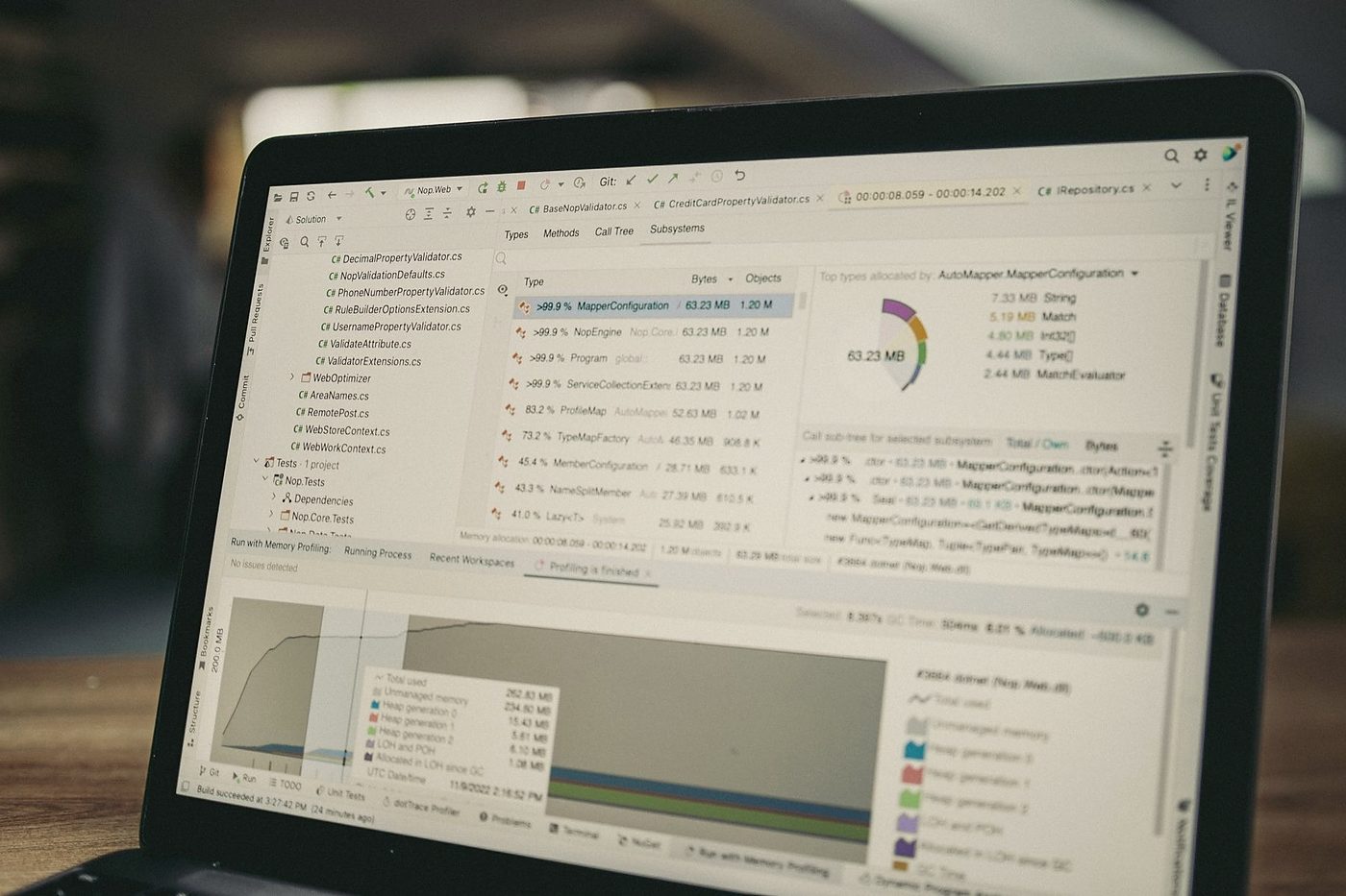 Close-up of a laptop screen showing application profiling software